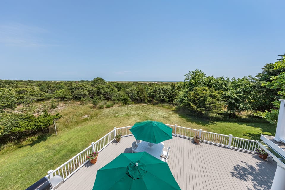 Back deck overlooking nature preserve and ocean.