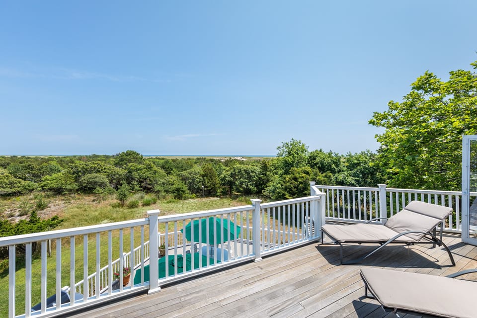 Back deck overlooking nature preserve and ocean.