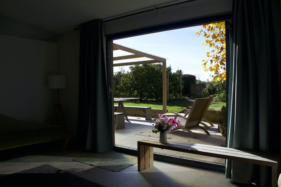 The living room doors that open up into the garden.