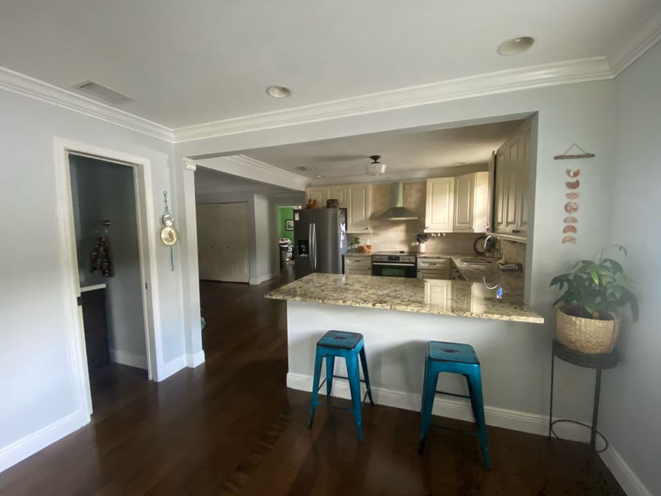 Half bath and kitchen bar/dining area