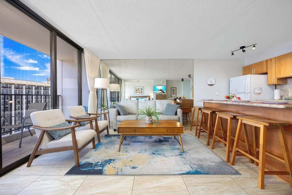 Bright, airy living room w/ open layout & stylish furnishings made for relaxing.
