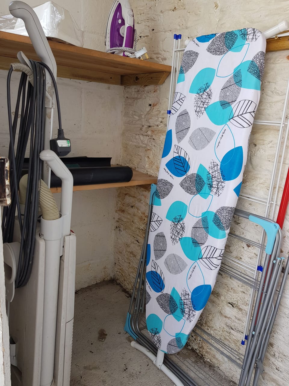 Out Room for wet gear, iron, ironing board, clothes horse, vacuum cleaner, etc