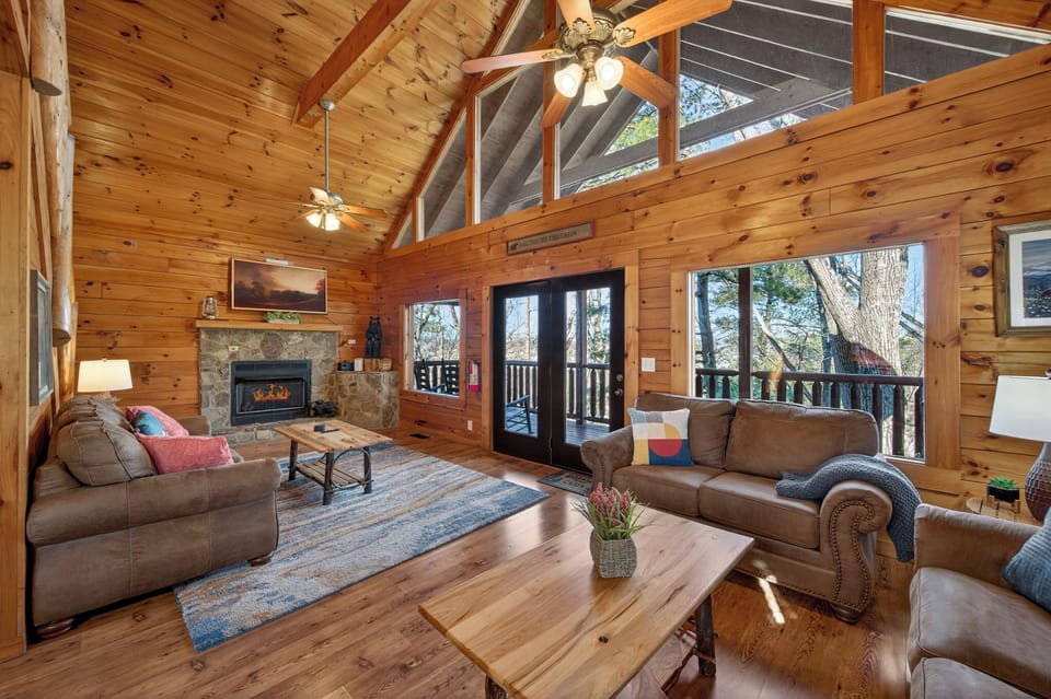 Main Floor Living Area.  3 Couches (1 a Queen Pullout) & 55” Smart TV