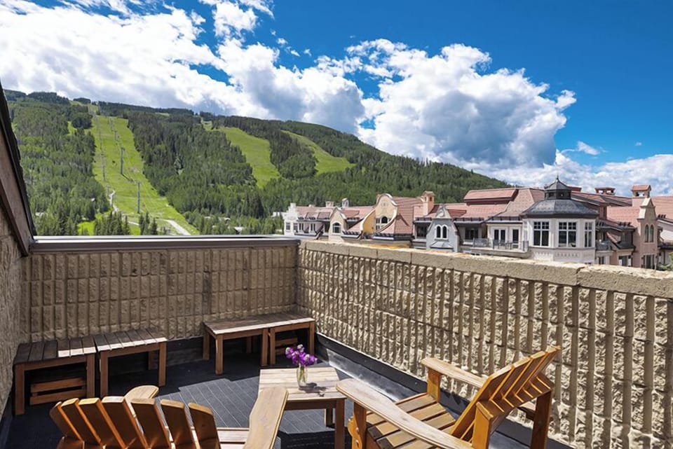 Relax on your private deck with sweeping mountain and ski slope views. Perfect for morning coffee or après-ski unwinding in the fresh alpine air.