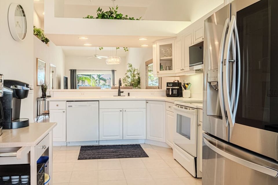 Open-layout kitchen with plenty of counter space ideal for preparing meals.