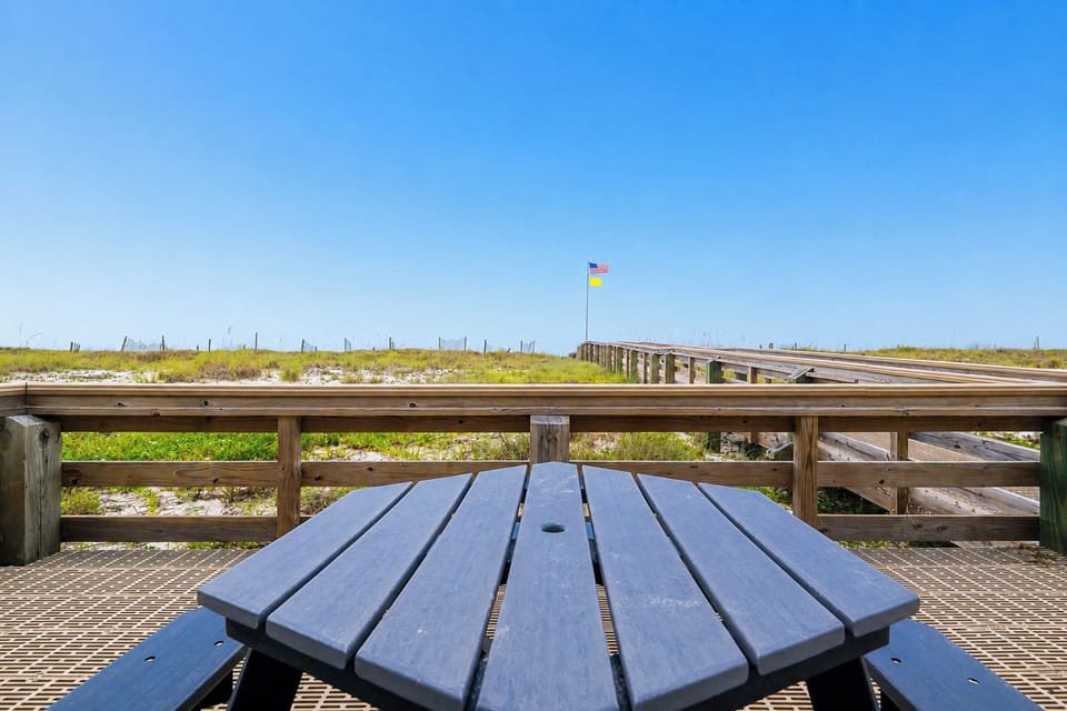 Enjoy a meal outdoors at the Pollywood picnic table, located beachside near the frilling area