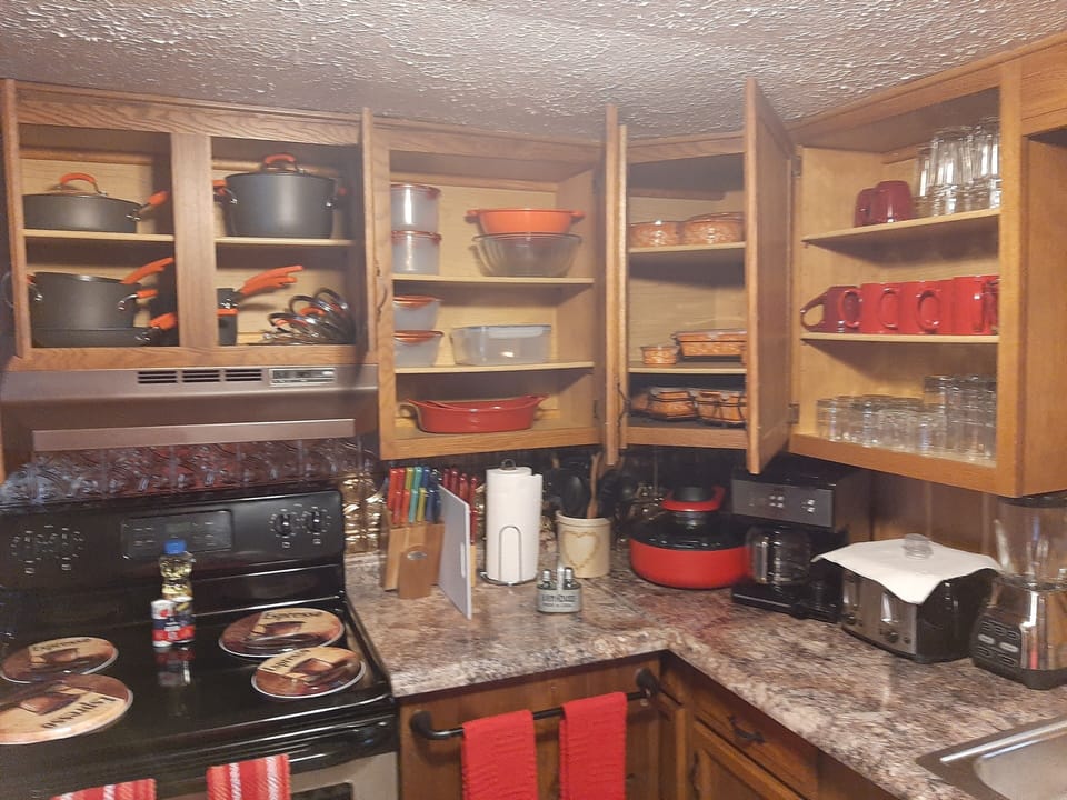 Kitchen is fully equipped with everything that you'll need