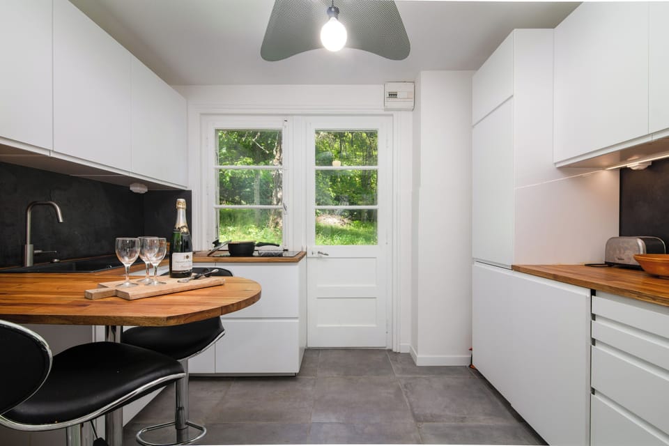 Kitchen  patio doors open to the garden