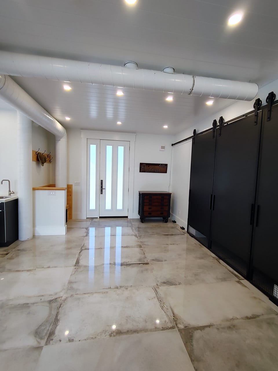 Front entrance with large walk-in mud-room and pantry