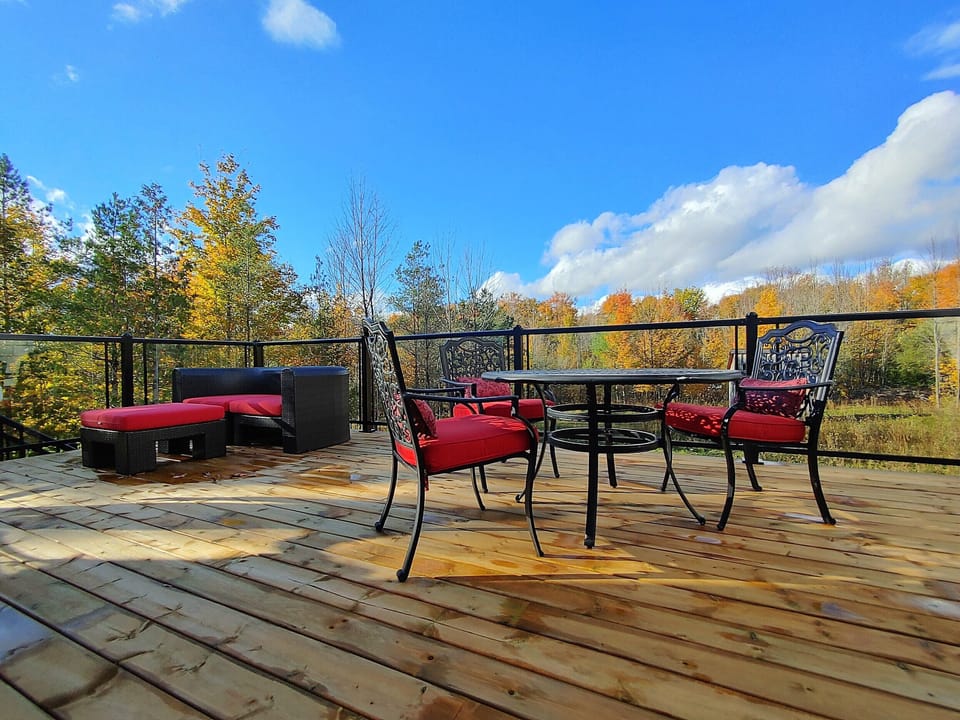 Patio off main floor overlooking the backyard 