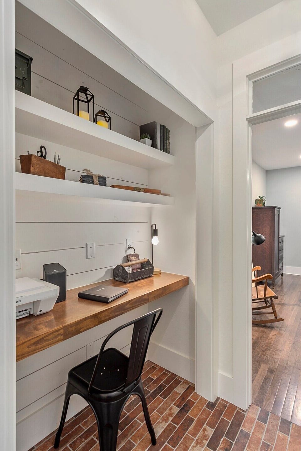 Built-in workstation is complete with printer, Wi-Fi, and a desk for guest to use.