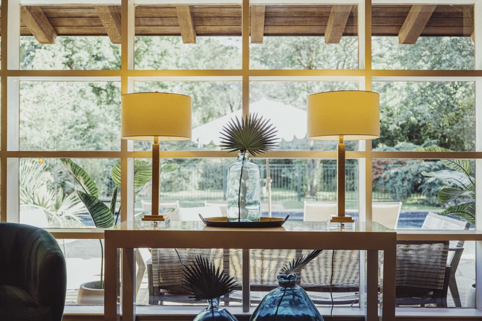 Living room windows overlooking the backyard