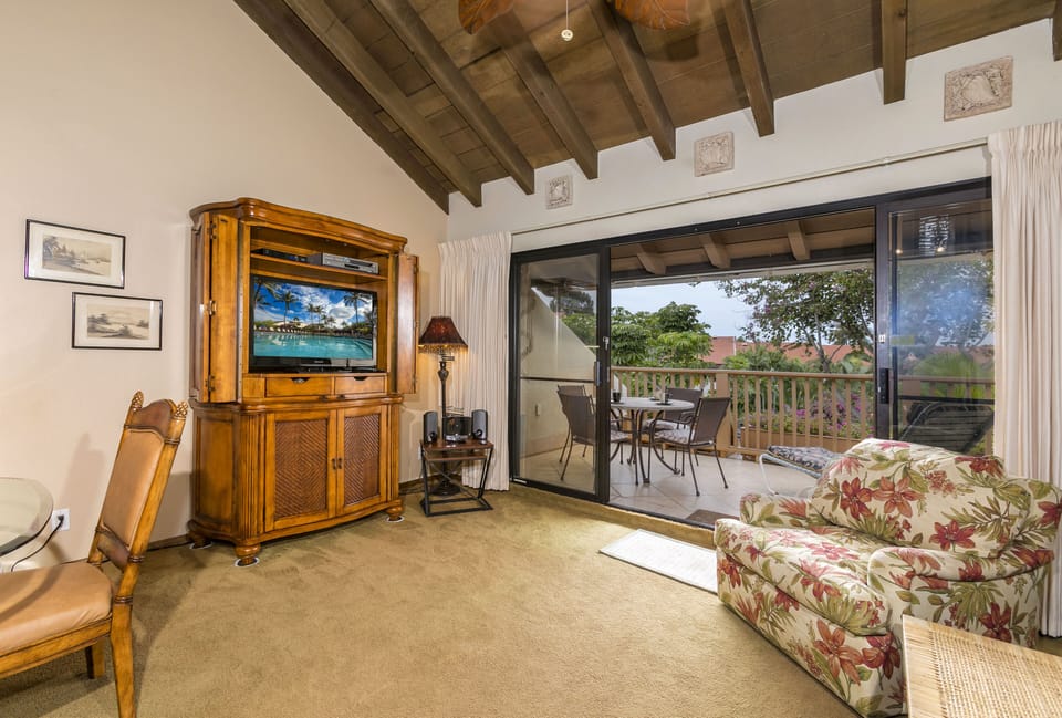 Living room with attached front lanai, water views