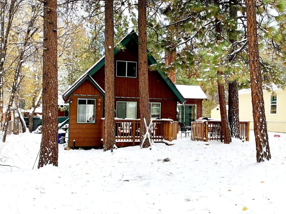 Snow covered Big Bear Cool Cabins, Far Enough Cabin front