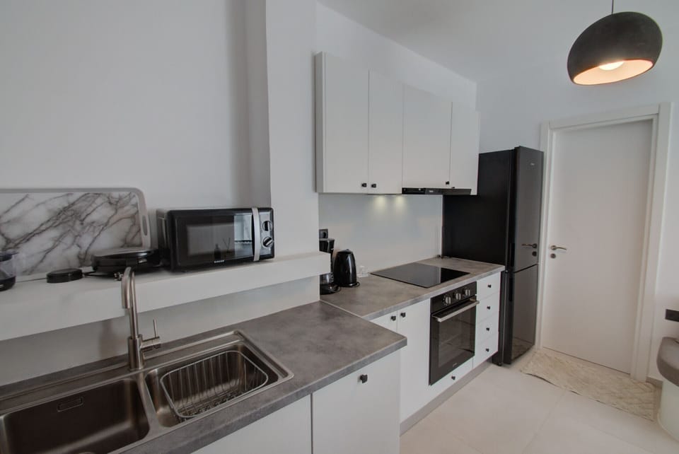 Open-plan fully equipped kitchen of Incredible sea view, private pool, near tavern, Plakias, Crete