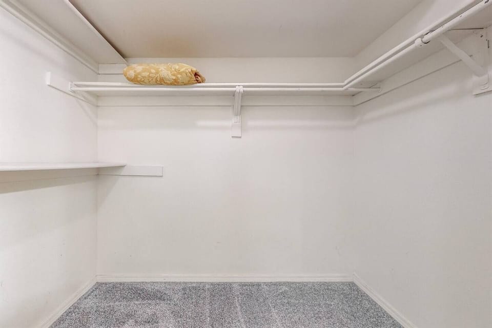 Extra closet space located in king bedroom
