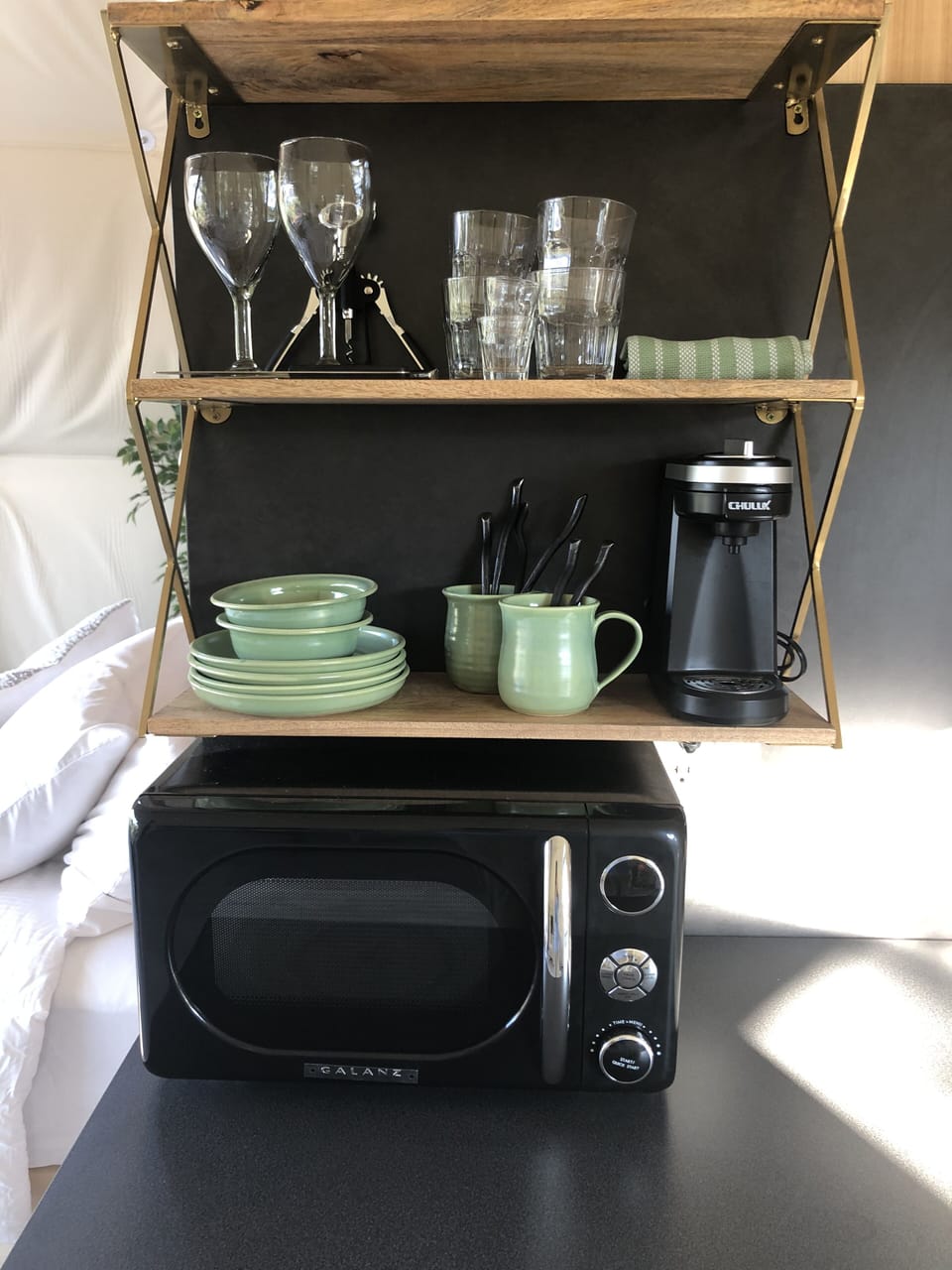 We supply glass ware, utensils, coffee maker, microwave, plates, coffee mugs.