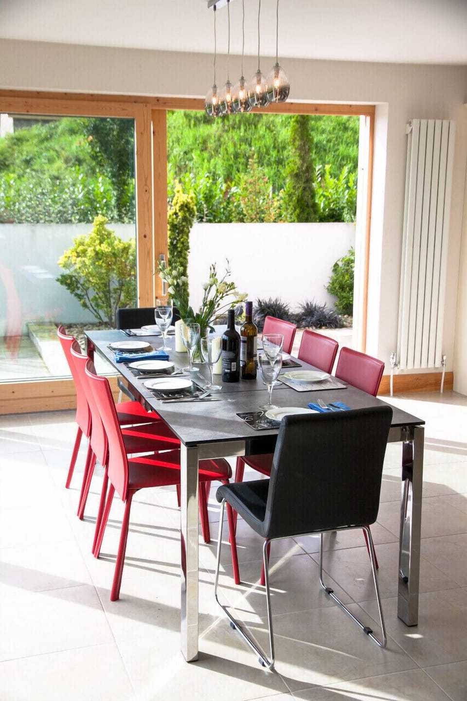 Dining table and sliding doorway to side entrance 