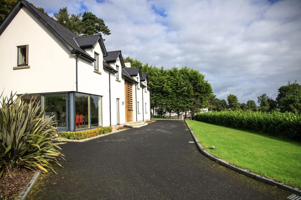 Outside view of the front and side grass garden