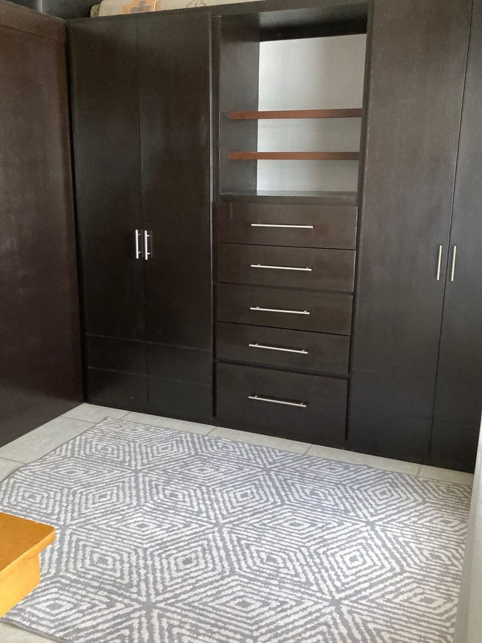 Walk in closet in large bedroom