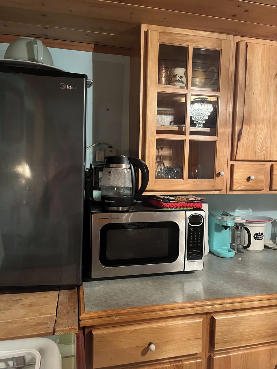 Larger small fridge. Tiny freezer. Microwave pictured -convection oven available