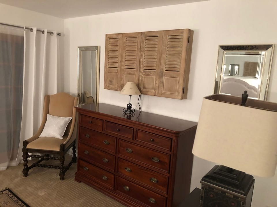 Master sitting area with TV cabinet