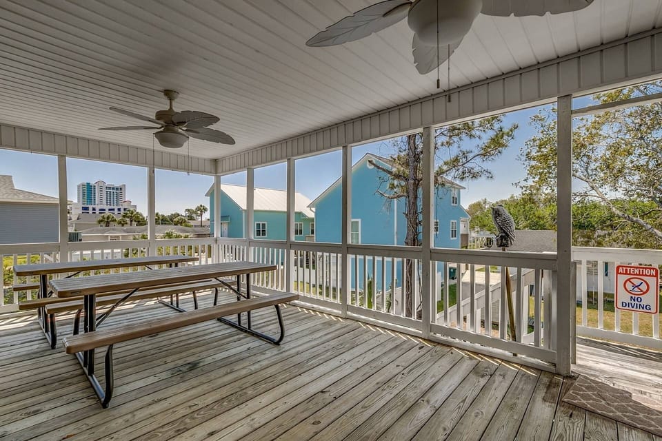 Covered Porch with Picnic Tables