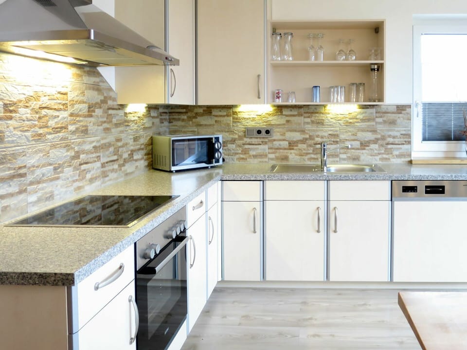 Countertop, Kitchen, Cabinetry, Room, Property, Furniture, Tile, Floor, Interior Design, Yellow