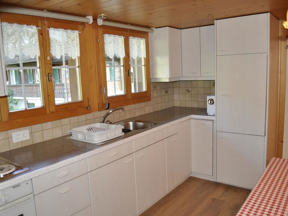 Cabinetry, Countertop, Tap, Sink, Property, Bathroom Cabinet, Furniture, Plumbing Fixture, Kitchen Sink, Building