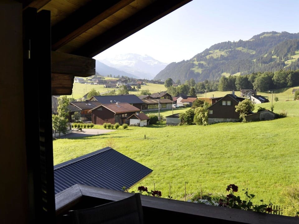 Sky, Plant, Property, Mountain, Building, Shade, Natural Landscape, Tree, House, Sunlight