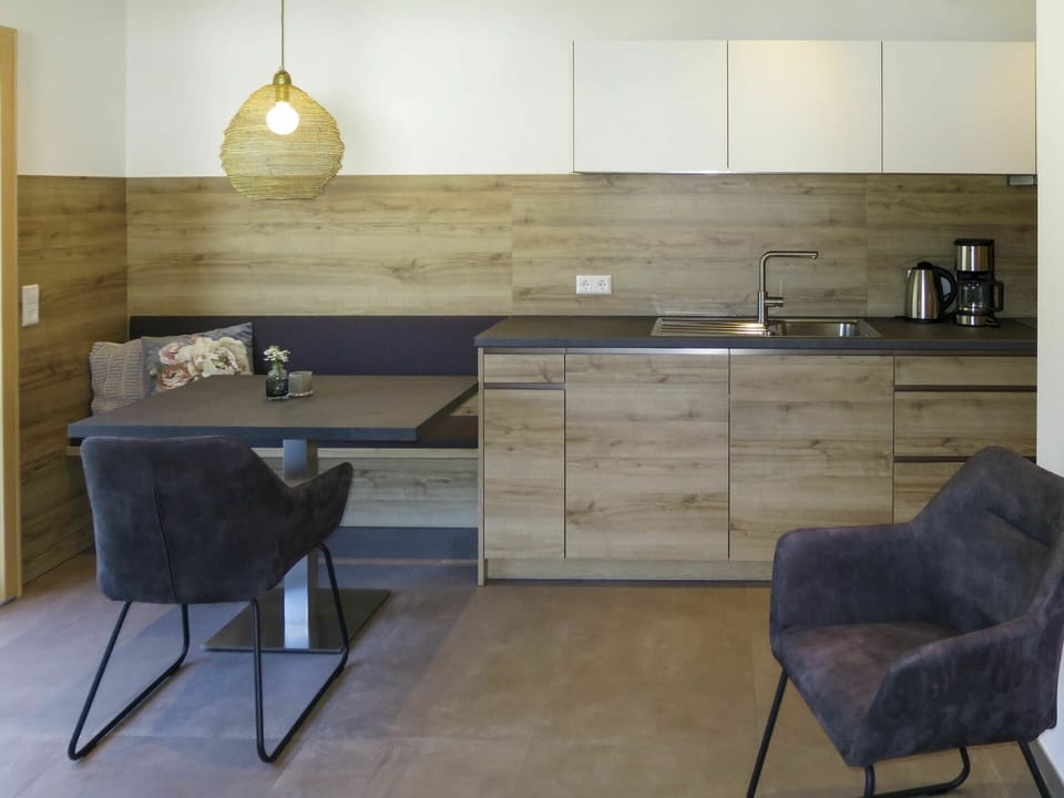 Furniture, Room, Floor, Property, Interior Design, Wall, Lighting, Table, Flooring, Building