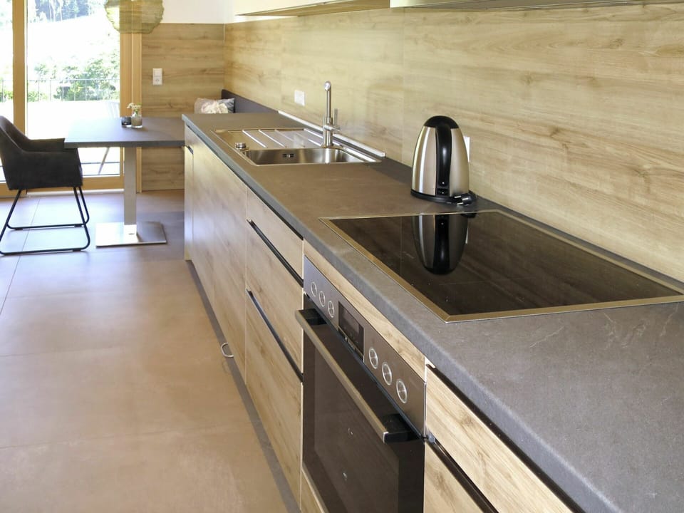 Countertop, Kitchen Sink, Sink, Tap, Cabinetry, Property, Plumbing Fixture, Kitchen, Kitchen Stove, Wood