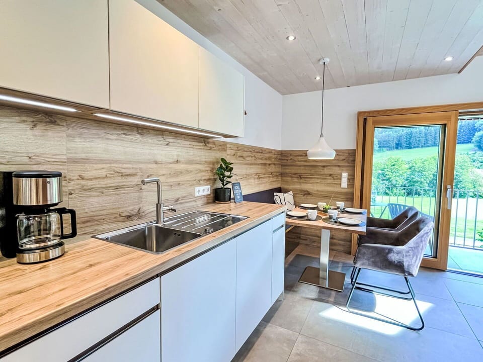 Flooring, Wood, Interior Design, Countertop, Kitchen, Furniture, Wood Flooring, Floor, Home, Cabinetry