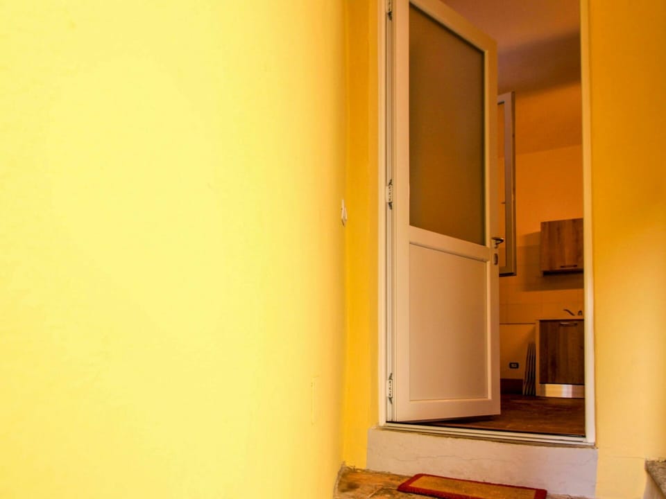 Yellow, Room, Property, Orange, Wall, House, Door, Building, Material Property, Architecture