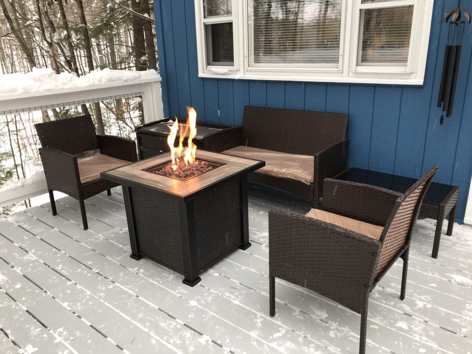 Our rear deck fire pit seating area is a great place to toast a lakeside sunset.