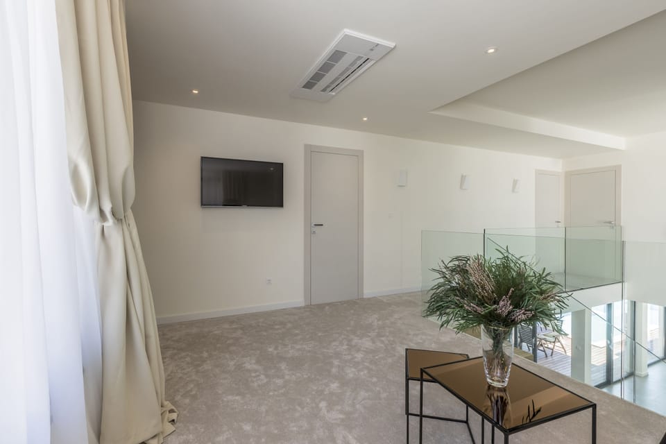 Upper gallery with TV and work desk for reading and relaxation
