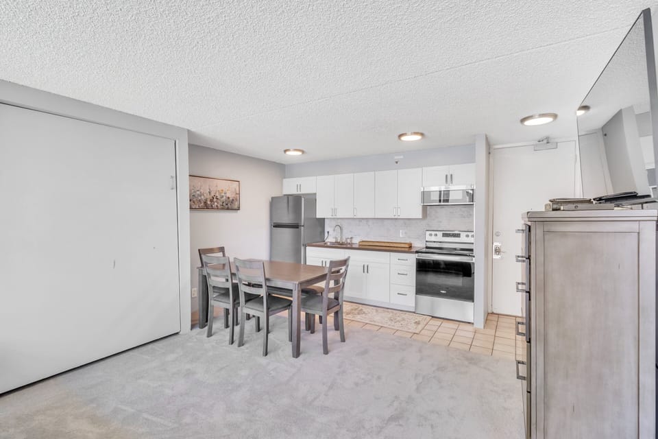 Indoors, Kitchen, Floor, Microwave, Refrigerator