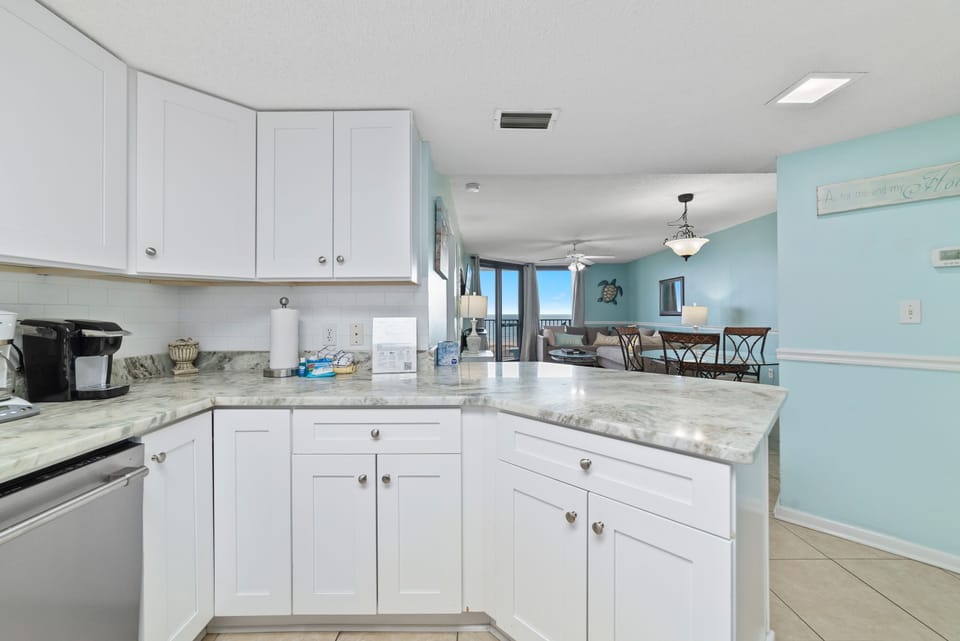 From morning coffee to gourmet dinners, this bright and inviting kitchen offers everything you need, seamlessly connecting to the dining and living areas for easy entertaining.