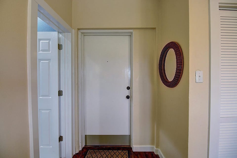 Step inside your welcoming entryway, where warm earth tones and thoughtful details create an inviting first impression of your home away from home.
