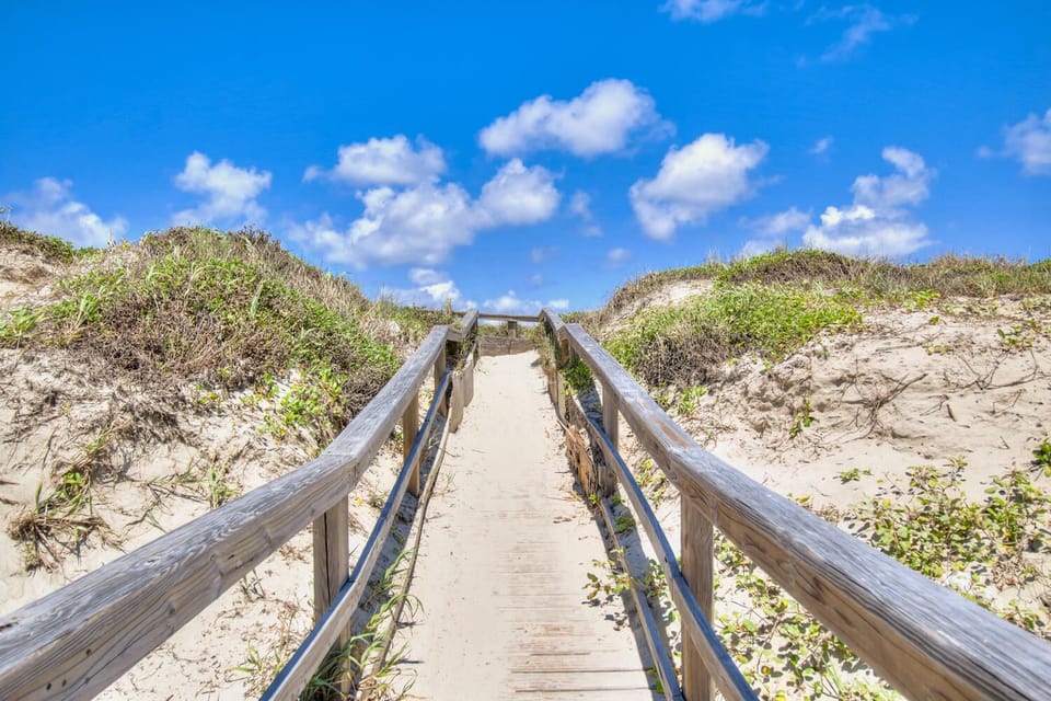 Boardwalk to the beach - Stroll through the boardwalk and step right onto the beach!