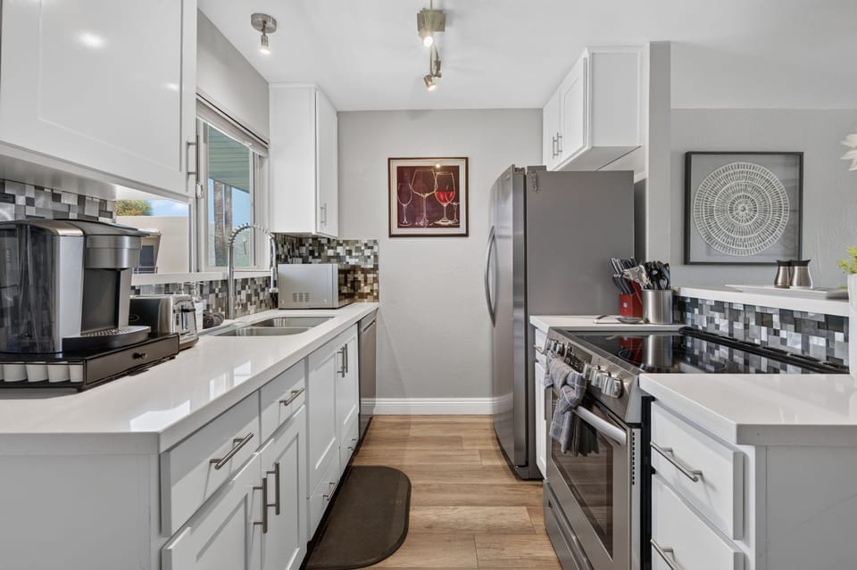 Bright, fully equipped kitchen makes meals at home easy and convenient
