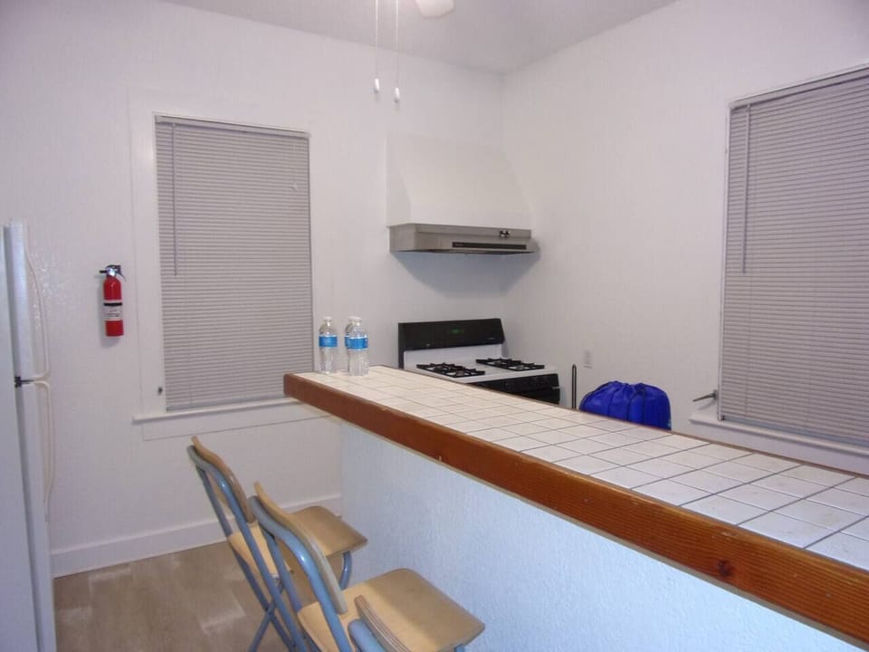 Kitchen with full sized gas range