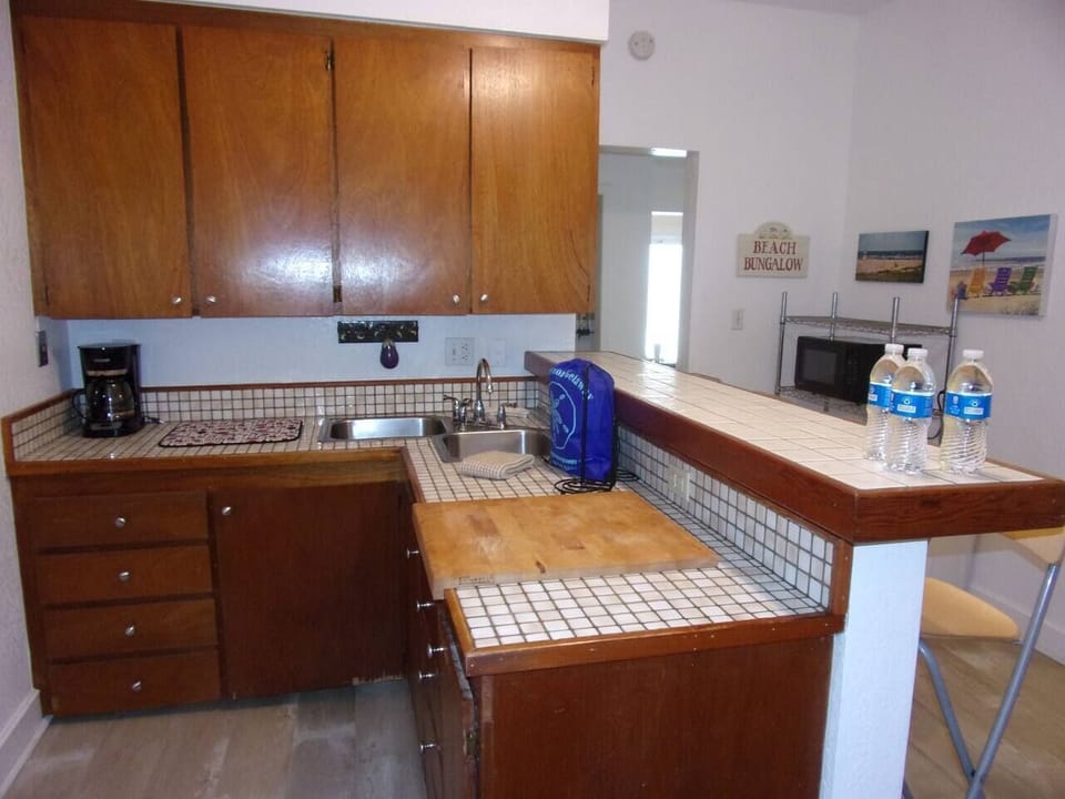 as well as microwave, refrigerator/freezer
