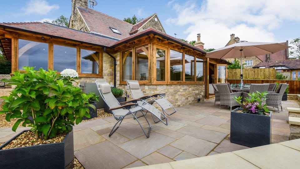 Patio to rear, Hyde Tyning Cottage, Bolthole Retreats