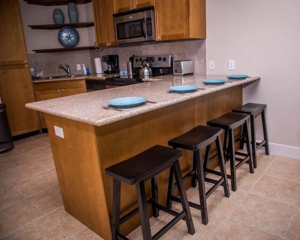 The long counter top is great for gathering or spreading out. 