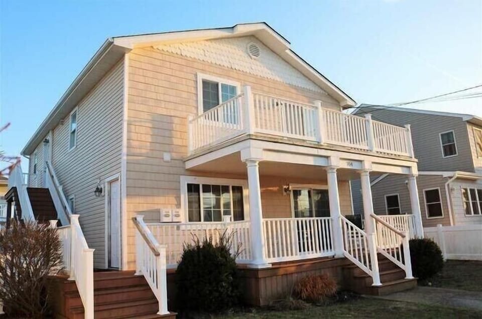 First floor condo with large front porch, WIFI, and stacked washer/dryer.