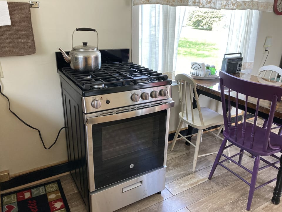 New gas stove in eat in kitchen 