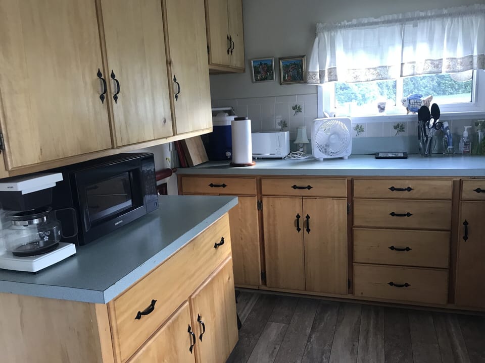 Fully stocked kitchen with basic condiments provided.