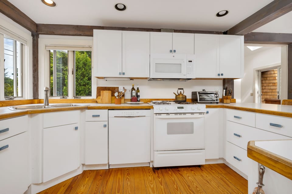 The kitchen is outfitted with everything you need. 