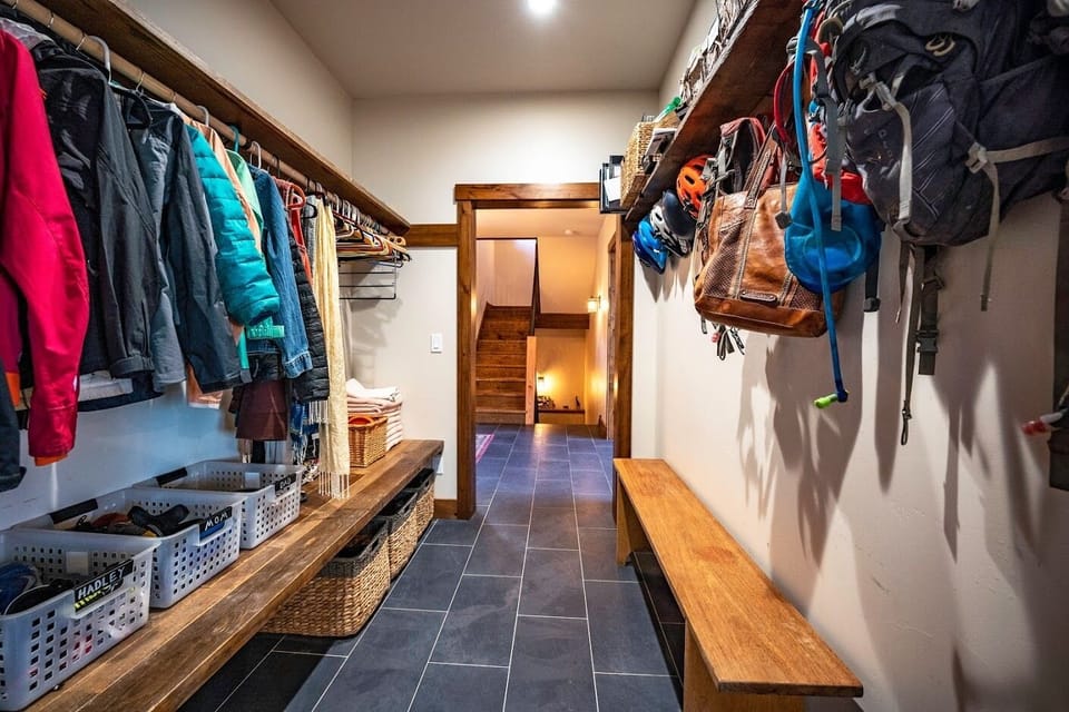 mudroom with custom shelves and bench